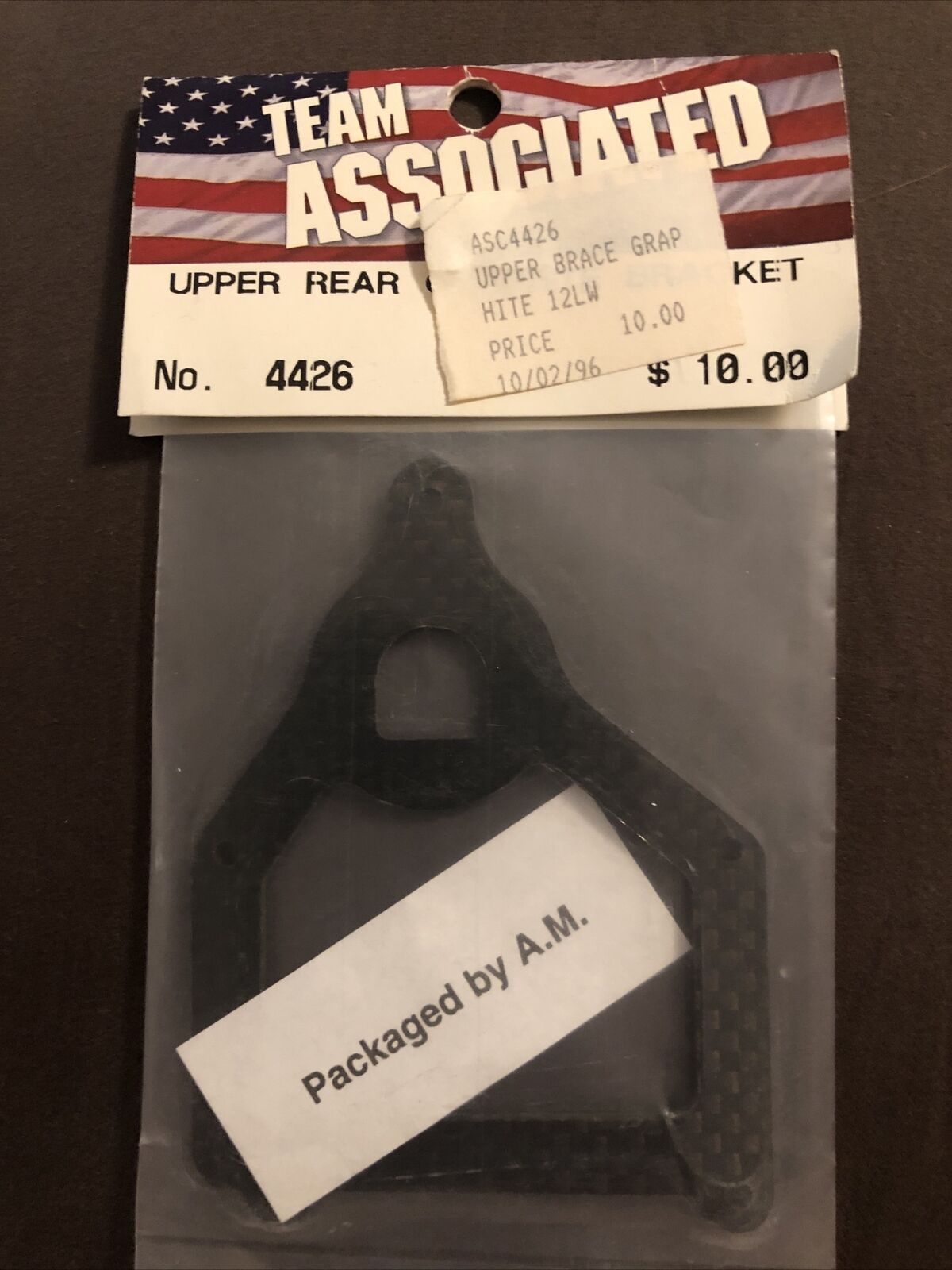 TEAM ASSOCIATED # 4426 UPPER REAR GRAPHITE BRACKET