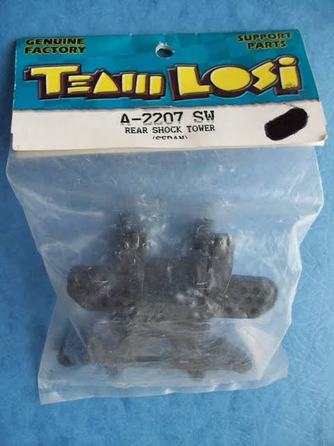 LOSA2207 REAR SHOCK TOWER (SEDAN)