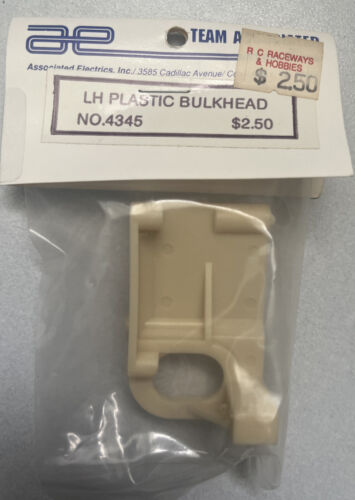 BRAND NEW Vintage TEAM ASSOCIATED #4345 RARE White LH PLASTIC BULKHEAD Left 12L