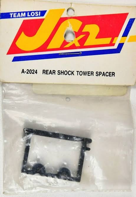 LOSA102590 A-2024 REAR SHOCK TOWER SPACER